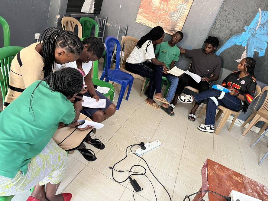 Scholars in group discussion at Yinnoh hub