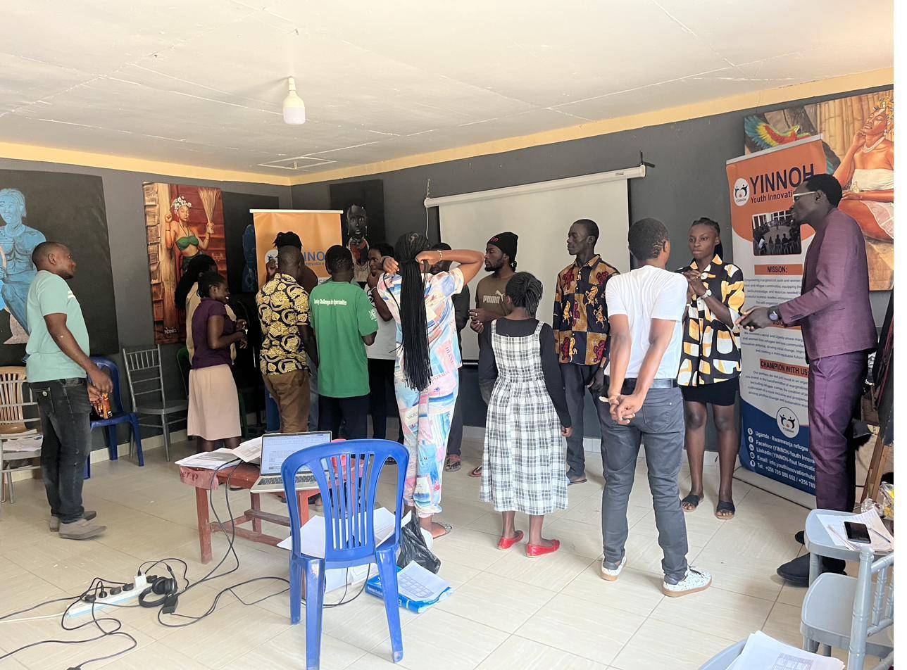 Yinnoh mentors and scholars in a collaborative session